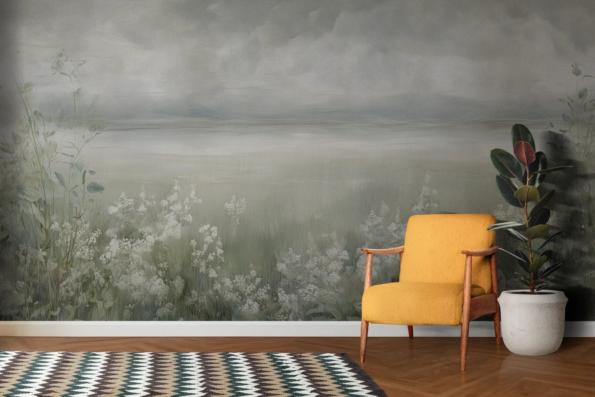 Wzór fototapety MISTY BLOOM FIELDS - tapeta z mglistą łąką i dzikimi kwiatami pokazanej w aranżacji salonu.
