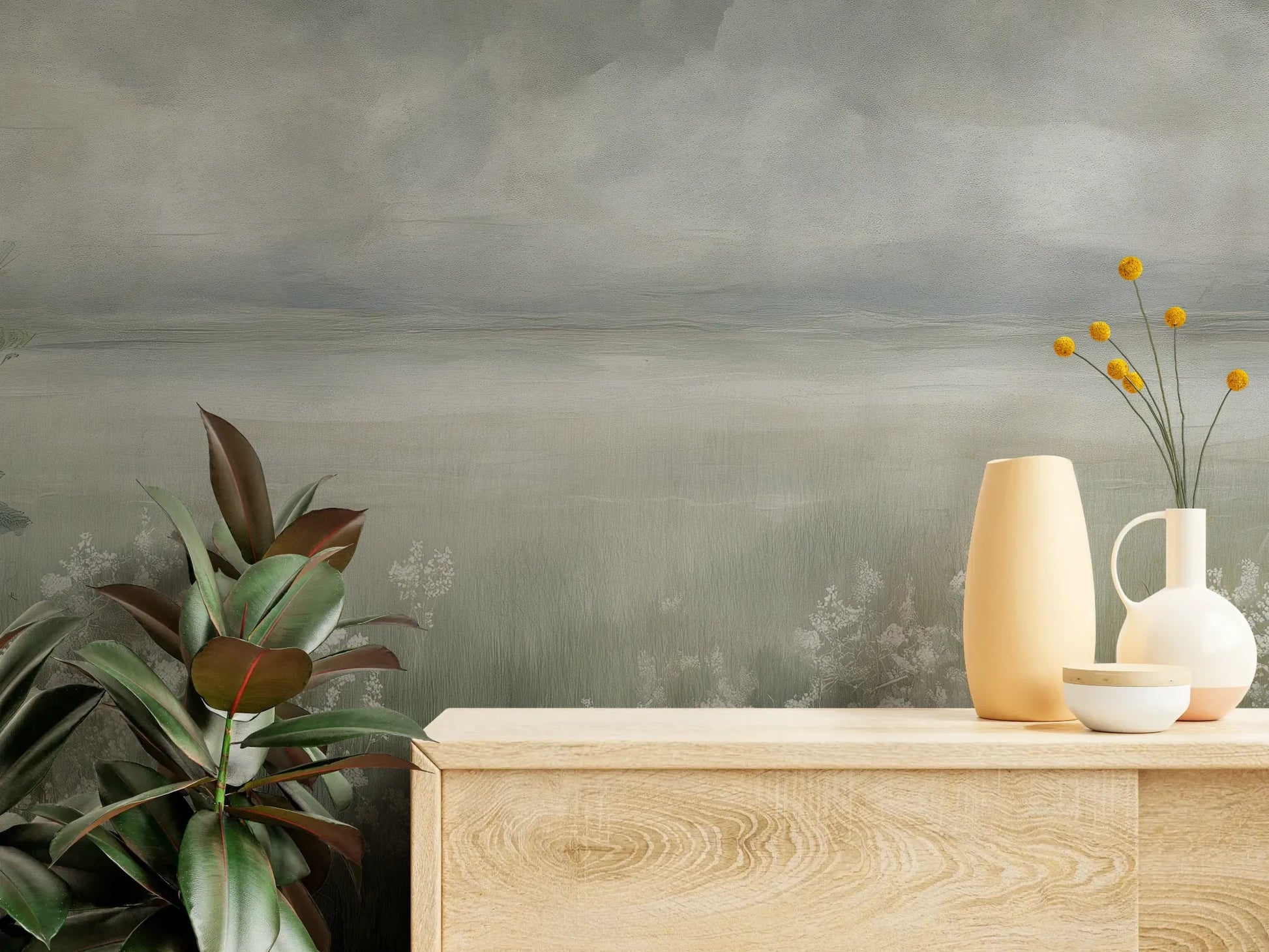 Fototapeta MISTY BLOOM FIELDS - tapeta z mglistą łąką i dzikimi kwiatami pokazana w aranżacji wnętrza z akcentem na ścianie.