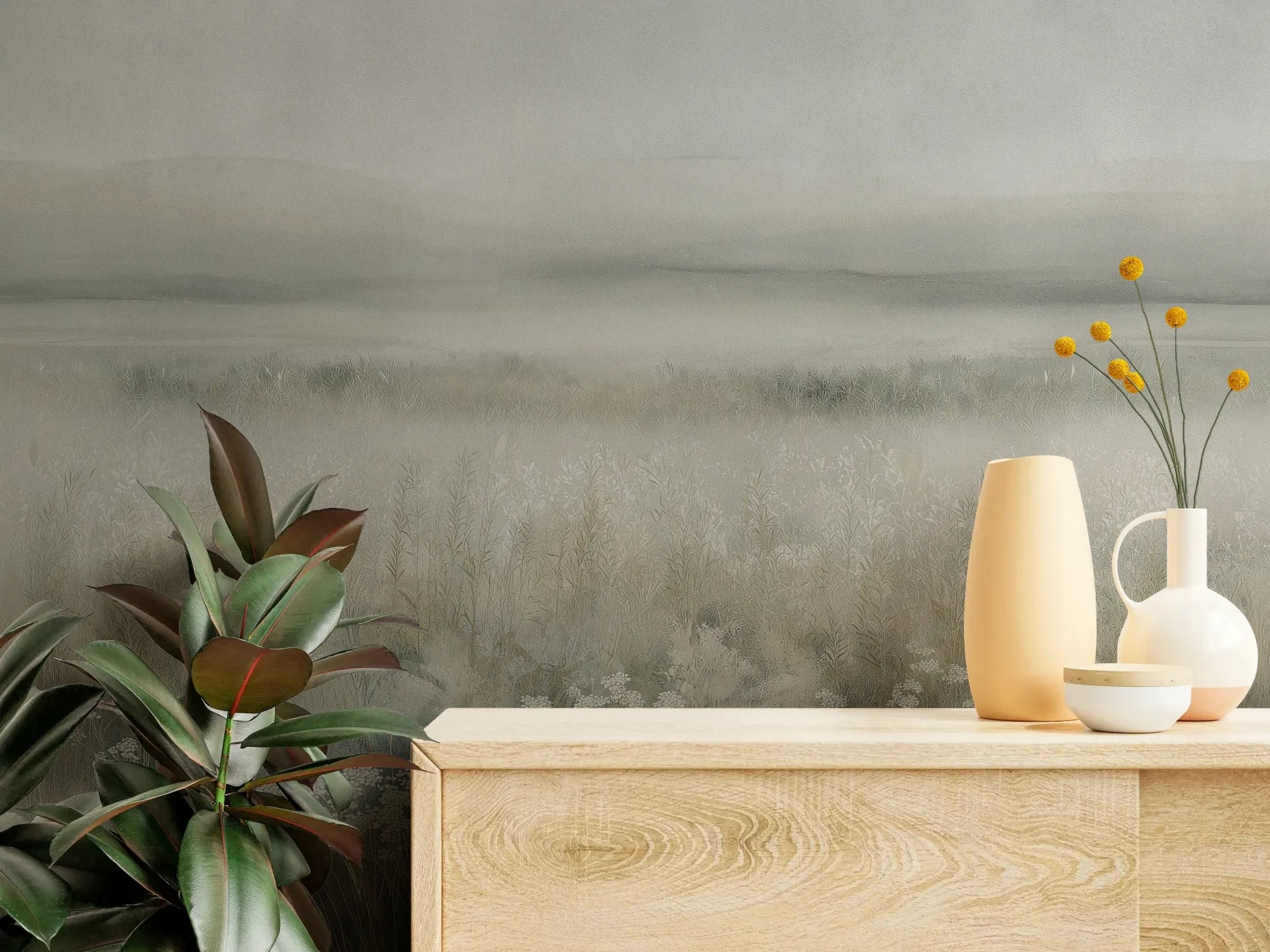 Fototapeta WHISPERED MEADOW - tapeta z mglistą łąką i kwiatami pokazana w aranżacji wnętrza z akcentem na ścianie.