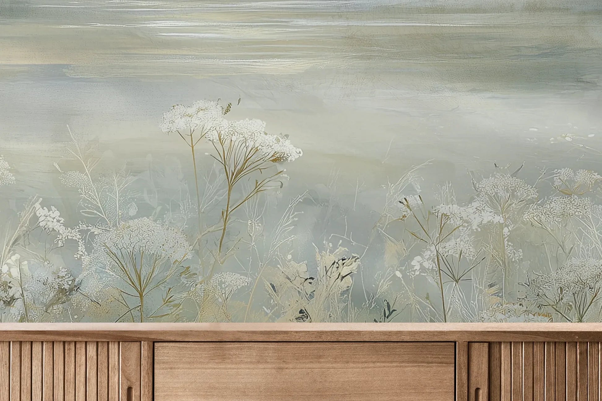 Fototapeta COASTAL WHISPERS - tapeta z łąką nad brzegiem morza pokazana w aranżacji wnętrza z akcentem na ścianie.