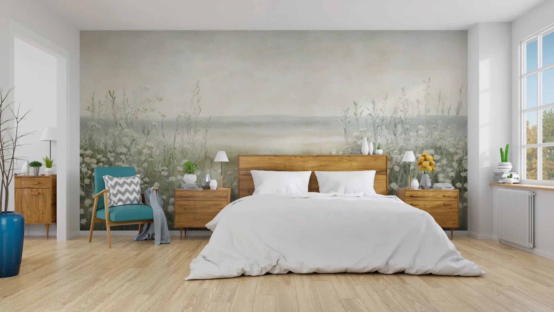 Wzór fototapety DAWN'S EMBRACE - tapeta z mglistą łąką i kwiatami pokazanej w aranżacji sypialni.