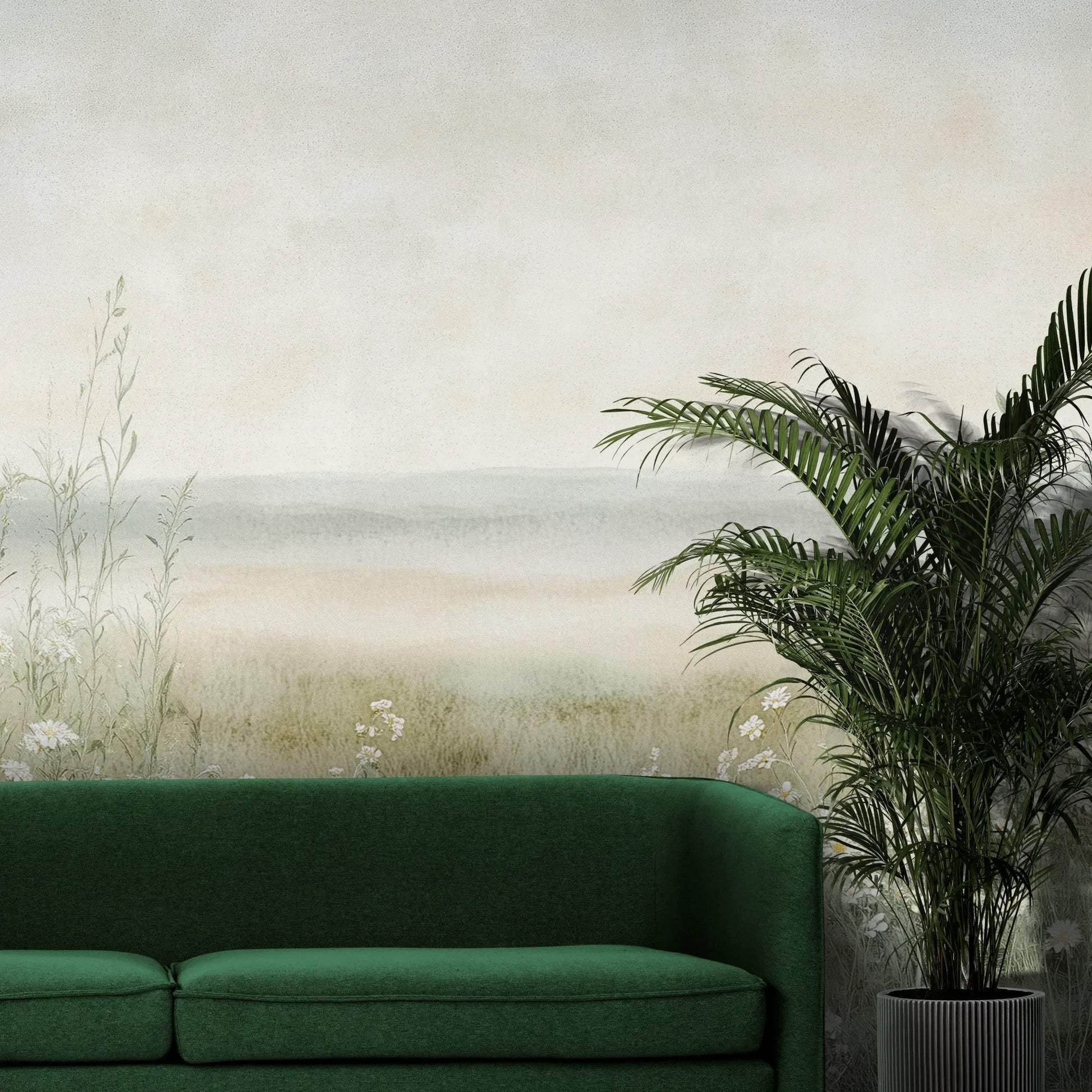 Fototapeta DAWN'S EMBRACE - tapeta z mglistą łąką i kwiatami pokazana w aranżacji wnętrza z akcentem na ścianie.