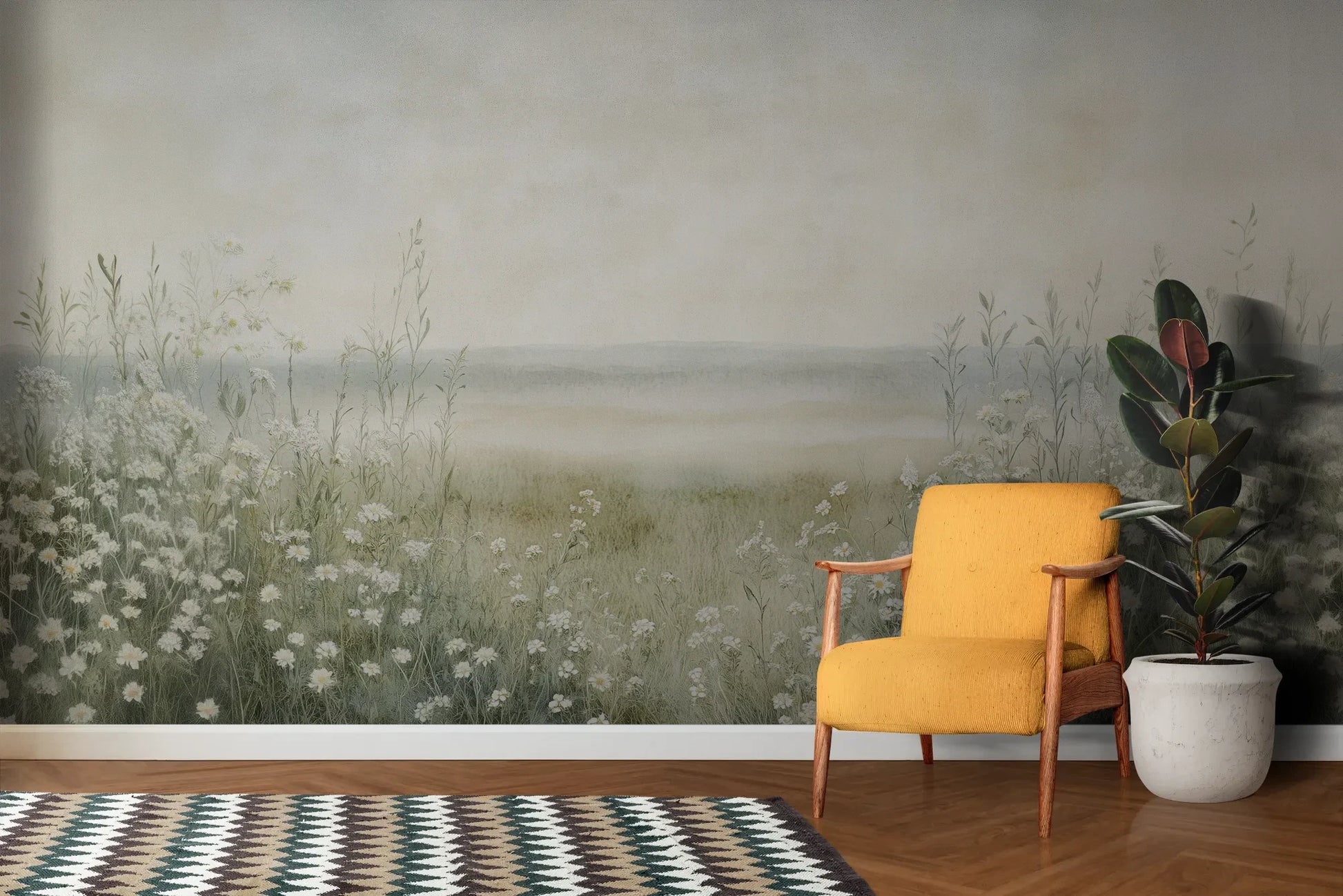 Wzór fototapety DAWN'S EMBRACE - tapeta z mglistą łąką i kwiatami pokazanej w aranżacji salonu.