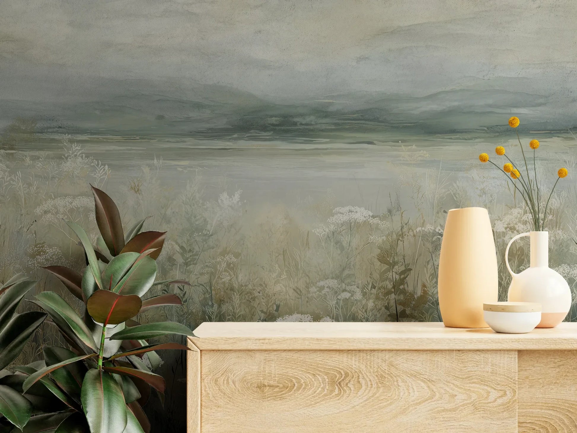 Fototapeta PALE WILDSCAPE - tapeta z łąką w delikatnej mgle pokazana w aranżacji wnętrza z akcentem na ścianie.