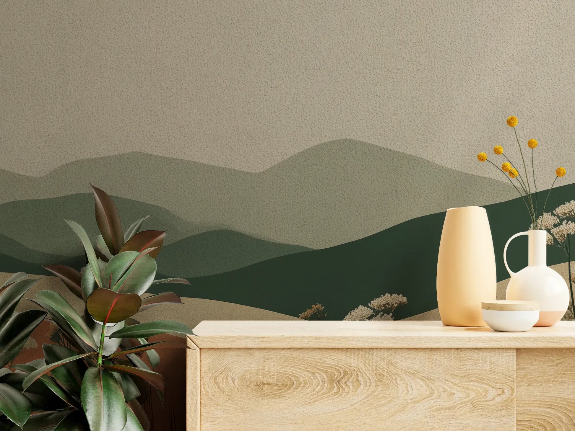 Fototapeta TERRACOTTA HIGHLANDS - tapeta z łąką i górami pokazana w aranżacji wnętrza z akcentem na ścianie.