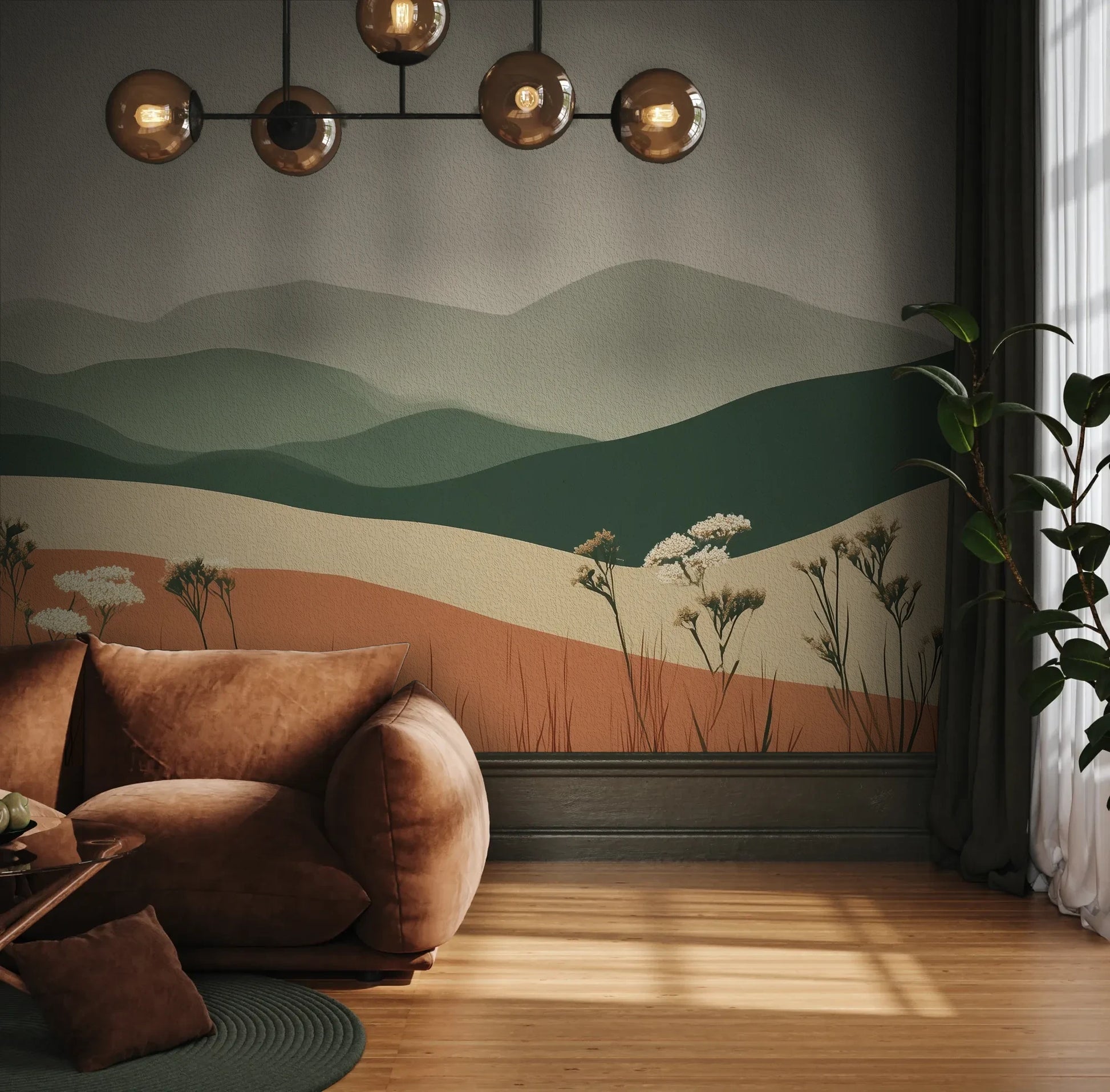 Fototapeta TERRACOTTA HIGHLANDS - tapeta z łąką i górami pokazana w aranżacji wnętrza z akcentem na ścianie.