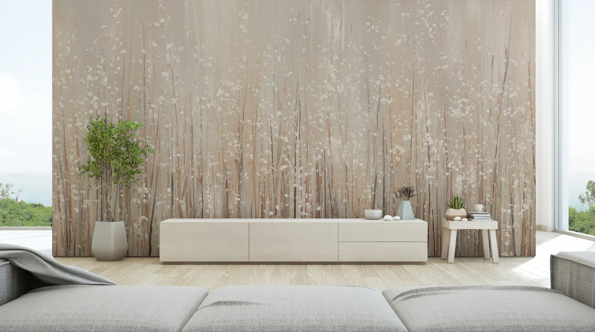 Wzór fototapety GOLDEN WHISPERS - tapeta z delikatnymi źdźbłami traw w beżowej tonacji pokazanej w aranżacji salonu.