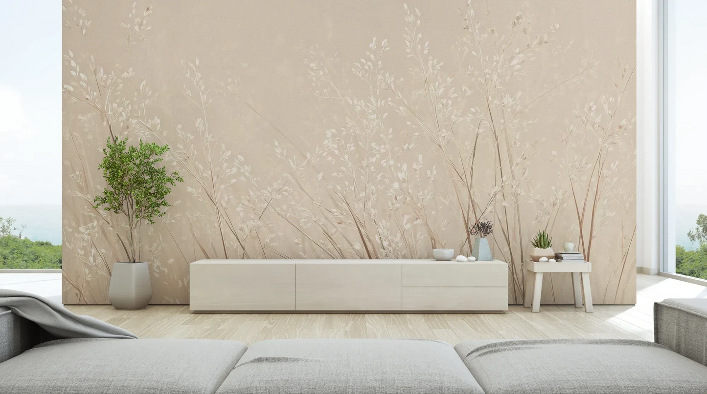 Wzór fototapety DUSTY ROMANCE - tapeta z delikatnymi trawami na beżowym tle pokazanej w aranżacji salonu.