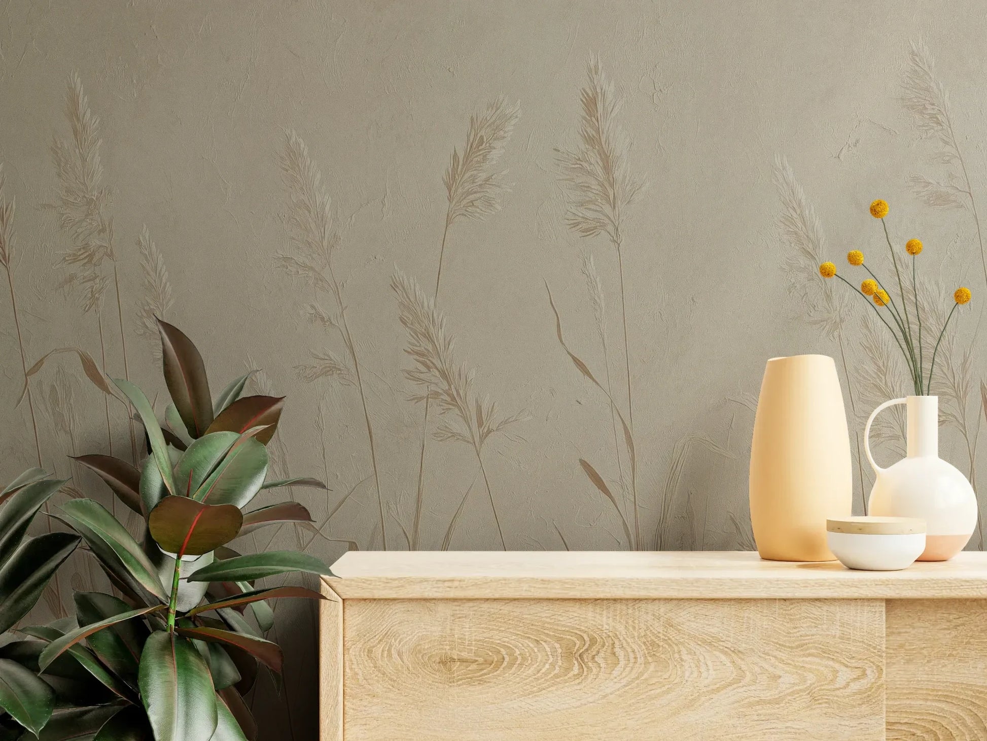 Fototapeta NATURE'S LULLABY - tapeta z delikatnymi źdźbłami traw w beżowej tonacji pokazana w aranżacji wnętrza z akcentem na ścianie.