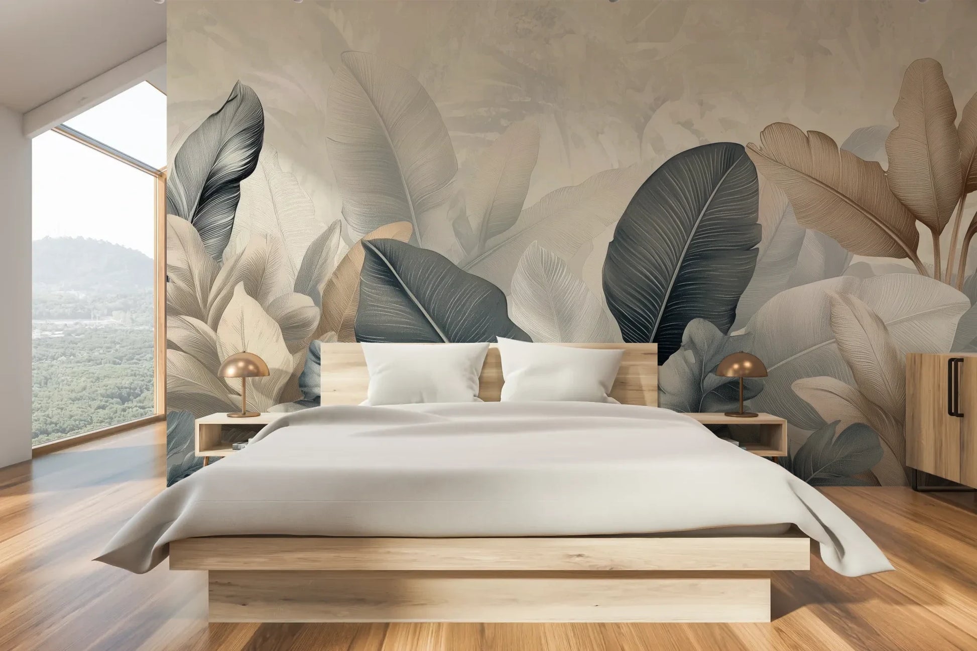 Wzór fototapety FEATHER SYMPHONY - tapeta z tropikalnymi liśćmi w stonowanych szarościach pokazanej w aranżacji sypialni.