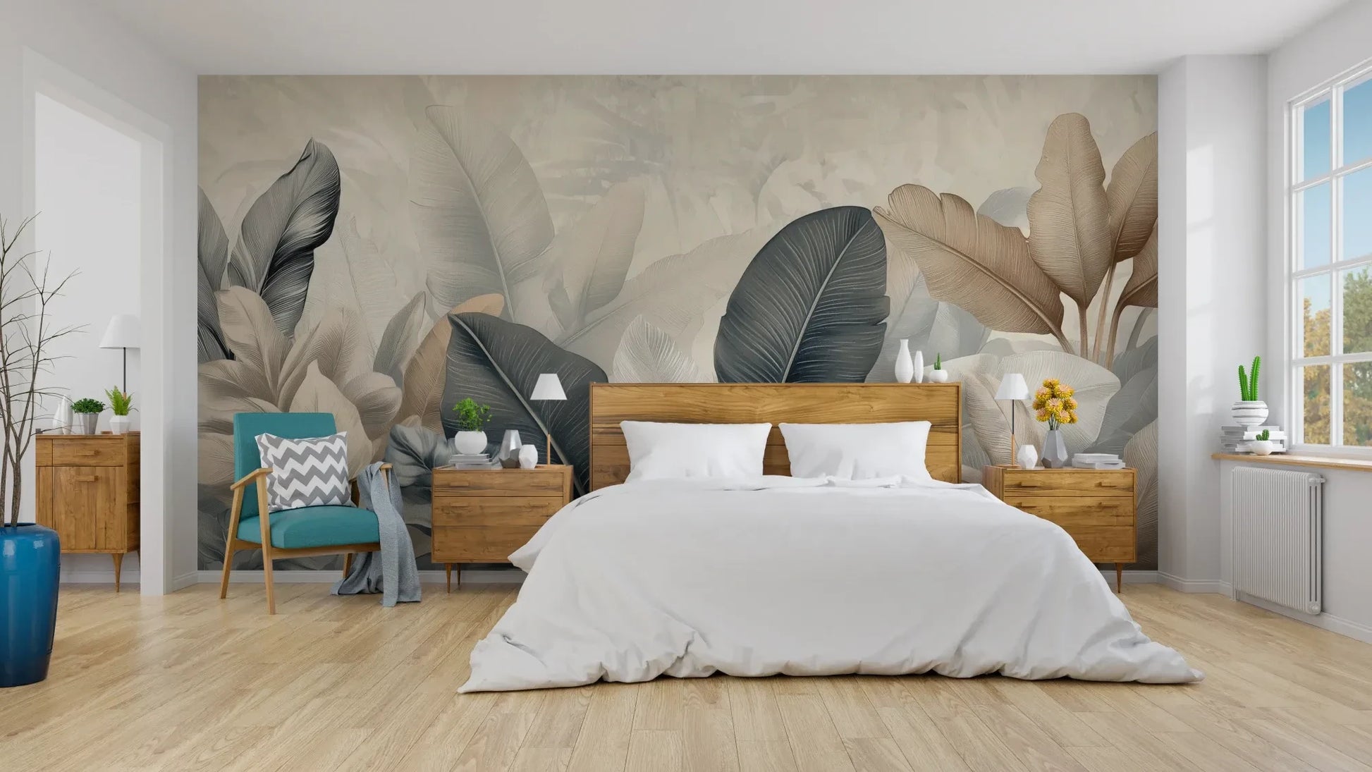 Wzór fototapety FEATHER SYMPHONY - tapeta z tropikalnymi liśćmi w stonowanych szarościach pokazanej w aranżacji sypialni.