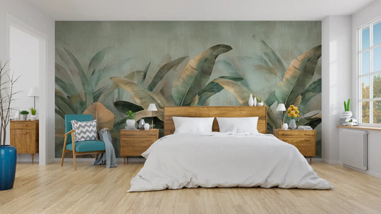 Wzór fototapety GOLDEN LEAVES - tapeta z tropikalnymi liśćmi w miętowo-złotej palecie pokazanej w aranżacji sypialni.
