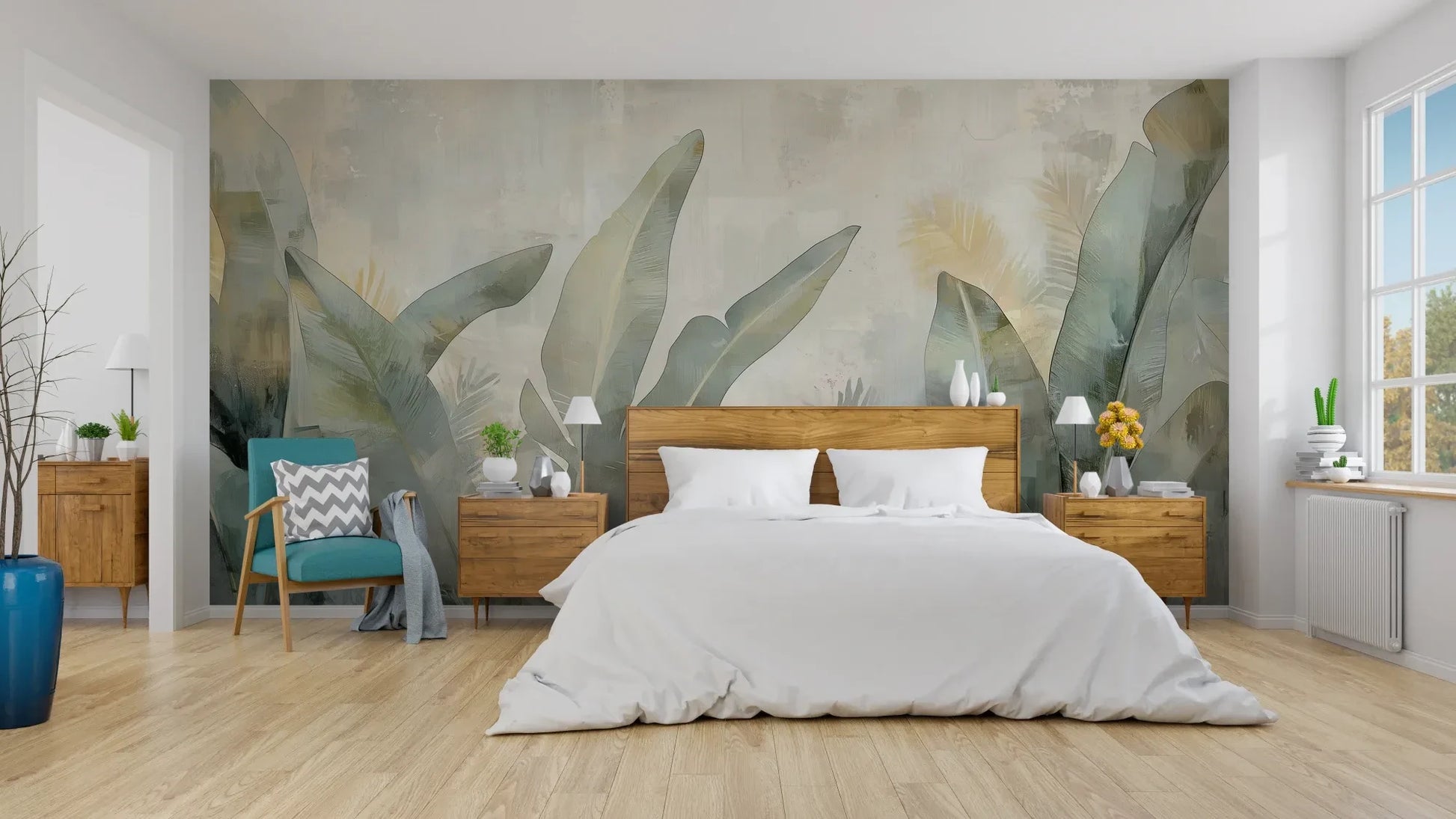 Wzór fototapety JADE CANOPY - tapeta z tropikalnymi liśćmi w stonowanych zieleniach pokazanej w aranżacji sypialni.