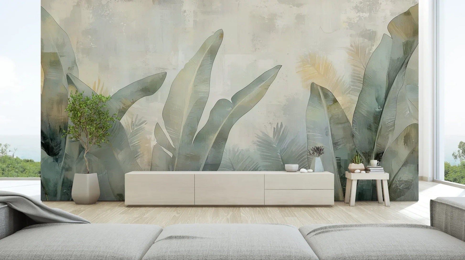 Wzór fototapety JADE CANOPY - tapeta z tropikalnymi liśćmi w stonowanych zieleniach pokazanej w aranżacji salonu.