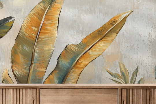 Fototapeta GILDED FOLIAGE - tapeta z tropikalnymi liśćmi w złoto-turkusowej palecie pokazana w aranżacji wnętrza z akcentem na ścianie.