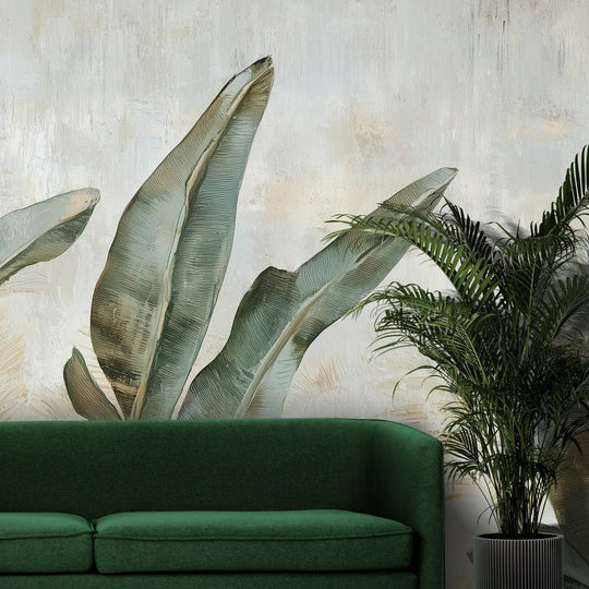 Fototapeta LEAFY SERENADE - tapeta z tropikalnymi liśćmi w akwarelowej poświacie pokazana w aranżacji wnętrza z akcentem na ścianie.