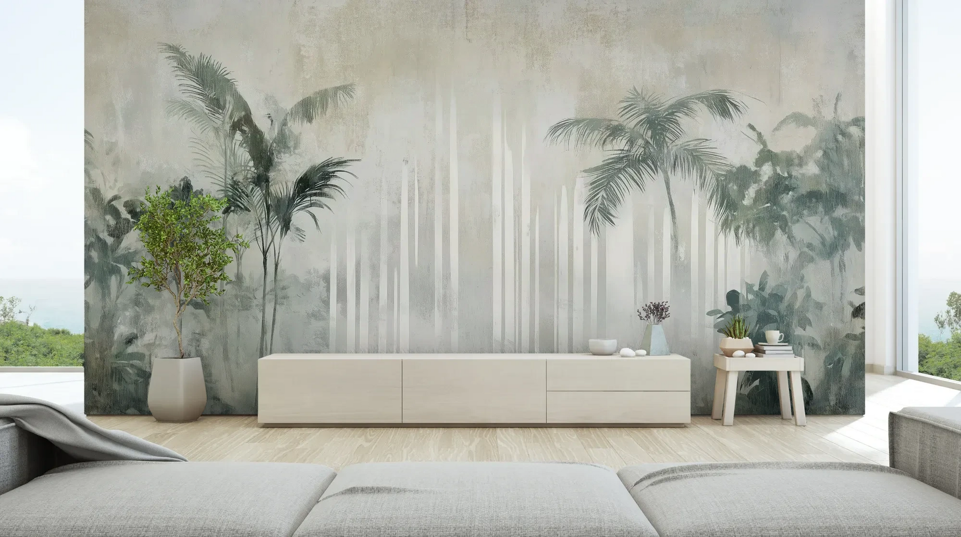 Wzór fototapety CRYSTAL PALMS - tapeta z mglistą dżunglą w delikatnych szarościach pokazanej w aranżacji salonu.