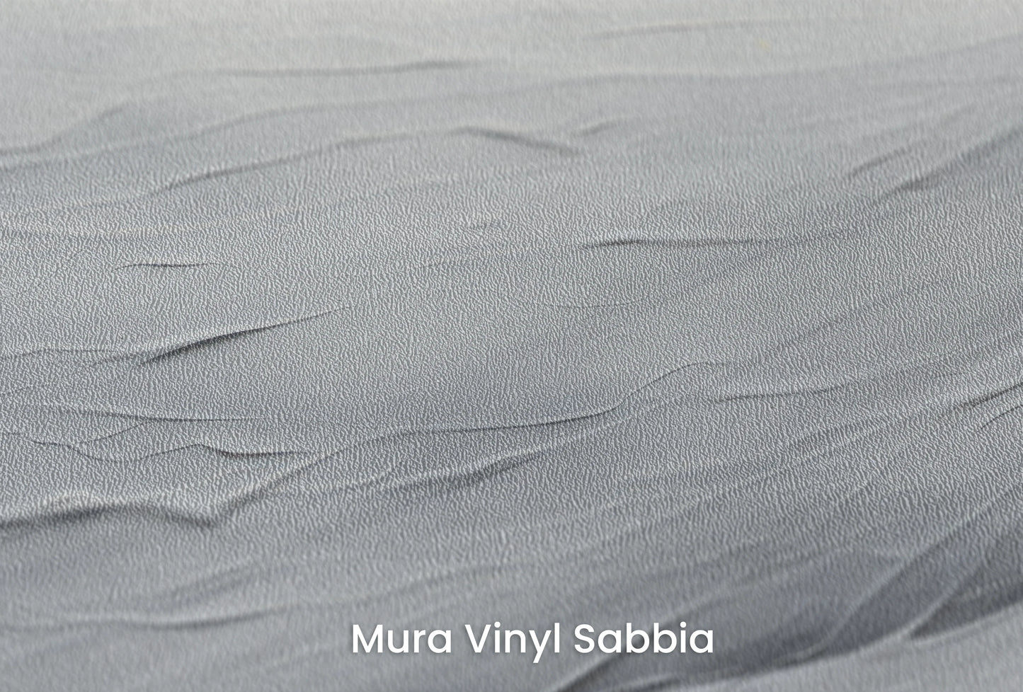 Zbliżenie na artystyczną fototapetę o nazwie Arctic Flow na podłożu Mura Vinyl Sabbia struktura grubego ziarna piasku.