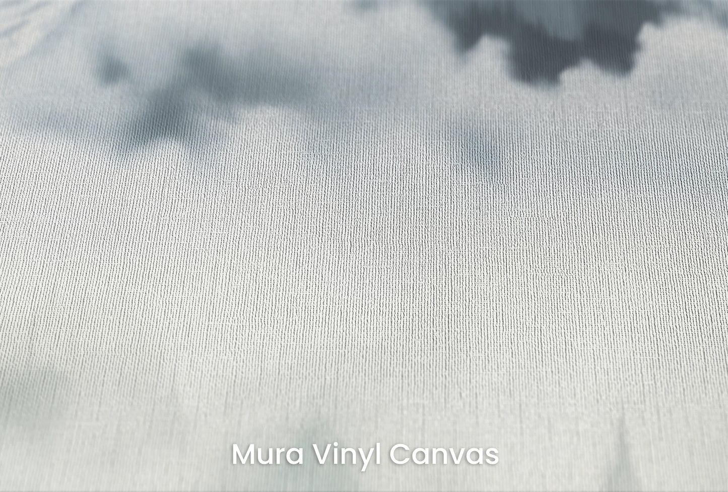 Zbliżenie na artystyczną fototapetę o nazwie Ethereal Mountain Whisper na podłożu Mura Vinyl Canvas - faktura naturalnego płótna.