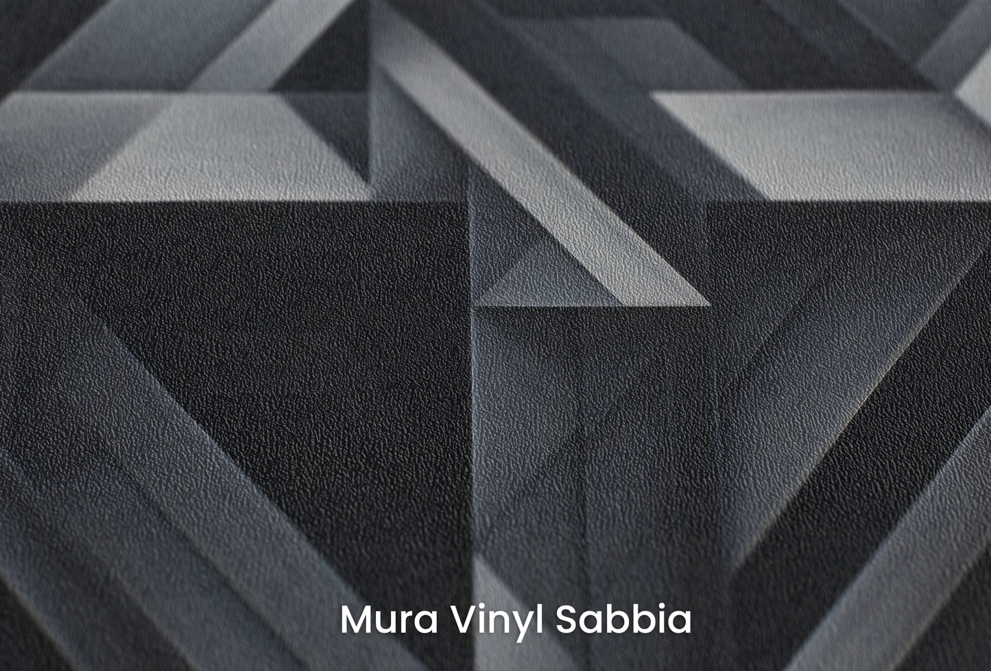 Zbliżenie na artystyczną fototapetę o nazwie Monochrome Geometry na podłożu Mura Vinyl Sabbia struktura grubego ziarna piasku.