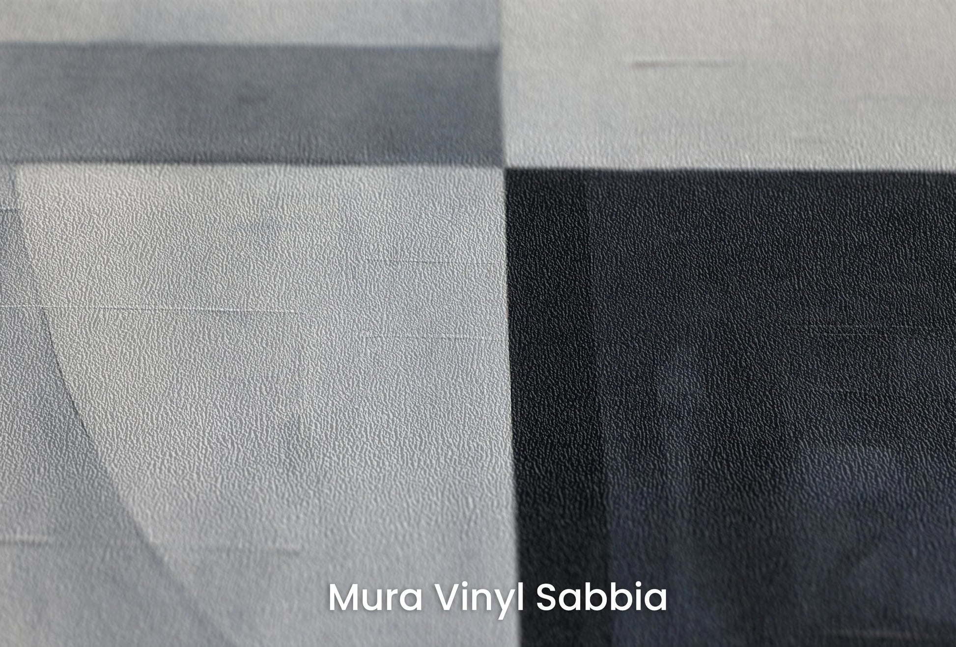 Zbliżenie na artystyczną fototapetę o nazwie Lunar Contrast na podłożu Mura Vinyl Sabbia struktura grubego ziarna piasku.
