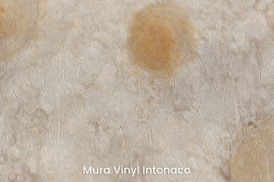 Zbliżenie na artystyczną fototapetę o nazwie GOLDEN MIST ORBITALS na podłożu Mura Vinyl Intonaco - struktura tartego tynku.