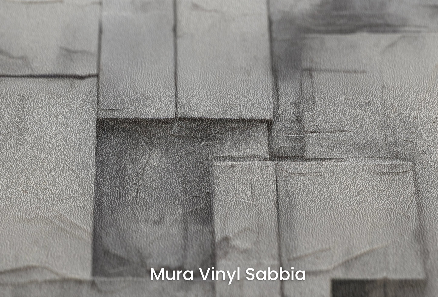 Zbliżenie na artystyczną fototapetę o nazwie Concrete Layers na podłożu Mura Vinyl Sabbia struktura grubego ziarna piasku.