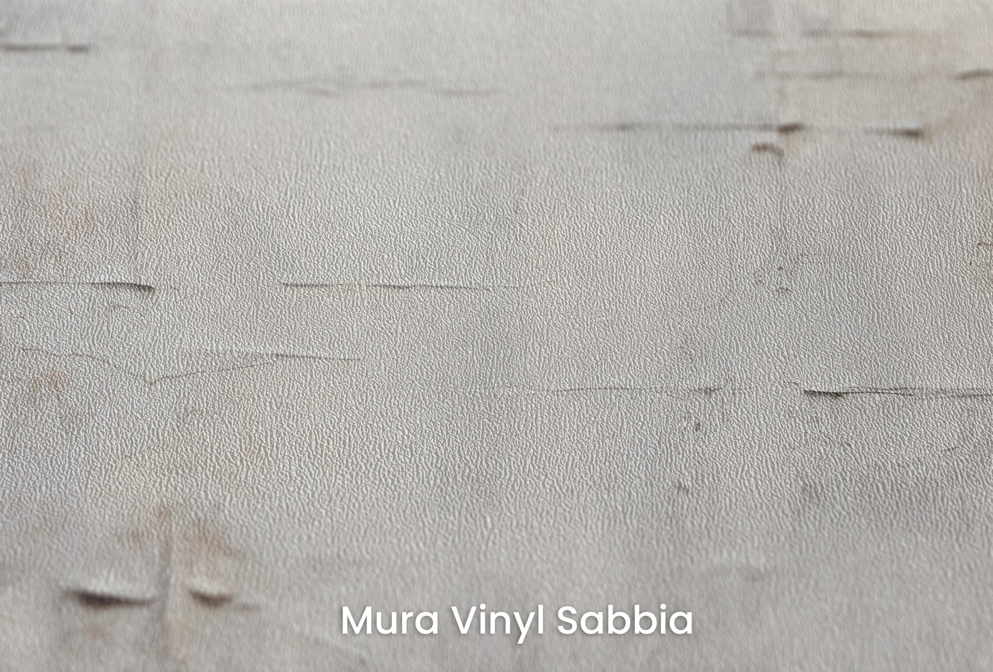 Zbliżenie na artystyczną fototapetę o nazwie ANCIENT WALLS na podłożu Mura Vinyl Sabbia struktura grubego ziarna piasku.