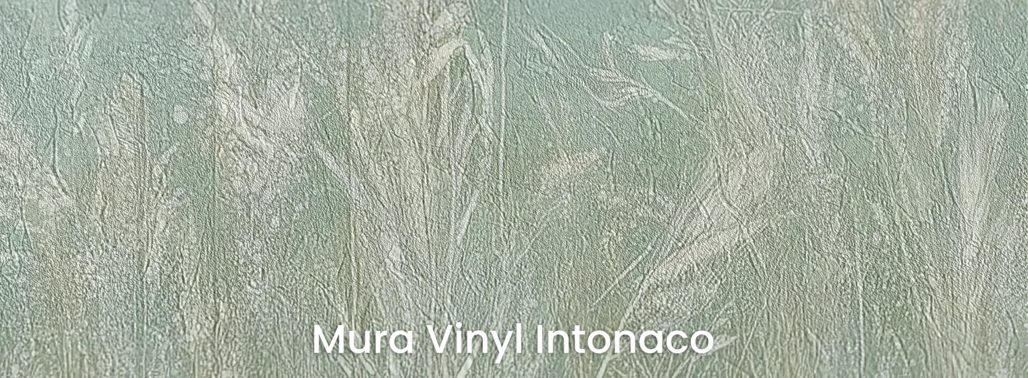 Zbliżenie na fototapetę REED VERSES - tapeta z delikatnymi trawami na miętowym tle na podłożu o strukturze tartego tynku.