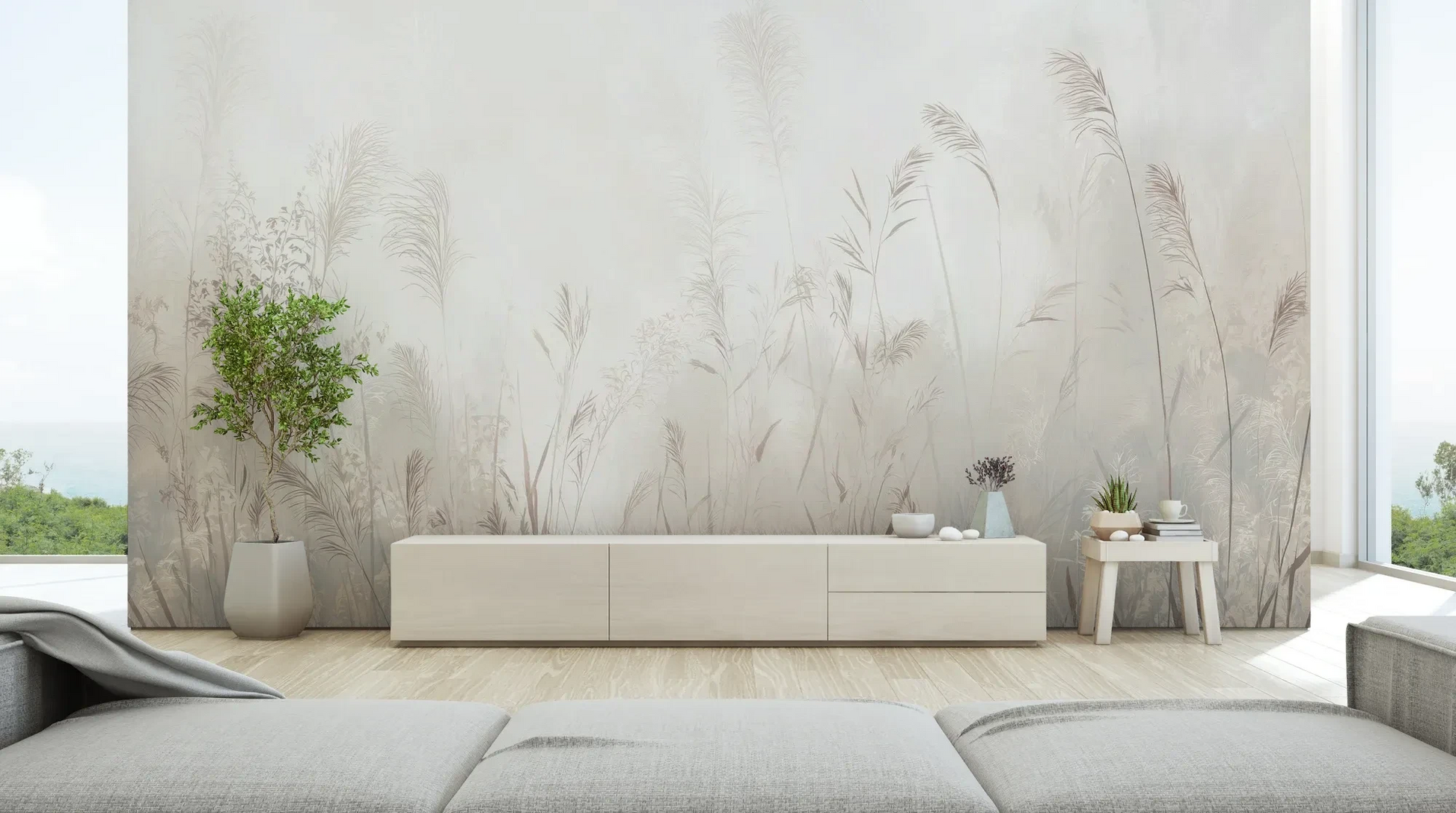 Wzór fototapety REED SYMPHONY - tapeta z mglistymi trawami w szarościach pokazanej w aranżacji salonu.