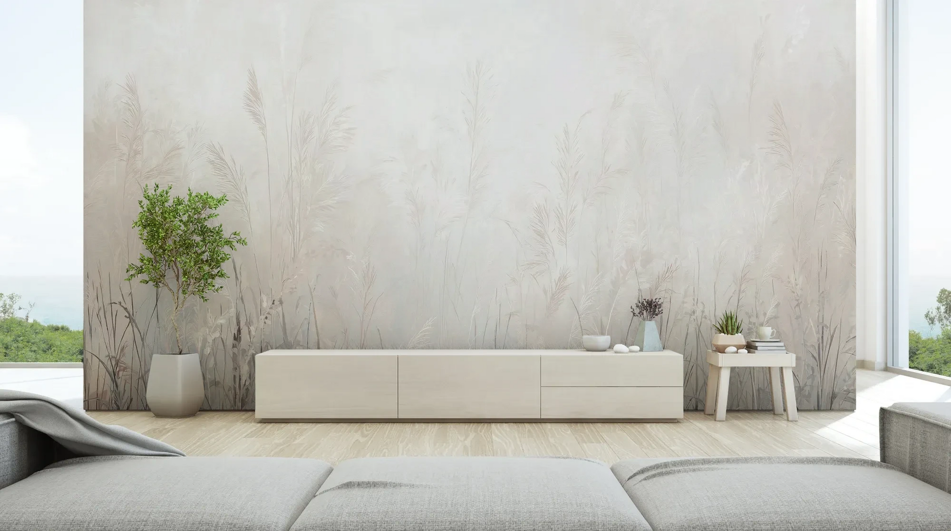Wzór fototapety LUMINOUS REEDS - tapeta z mglistymi trawami w jasnej tonacji pokazanej w aranżacji salonu.