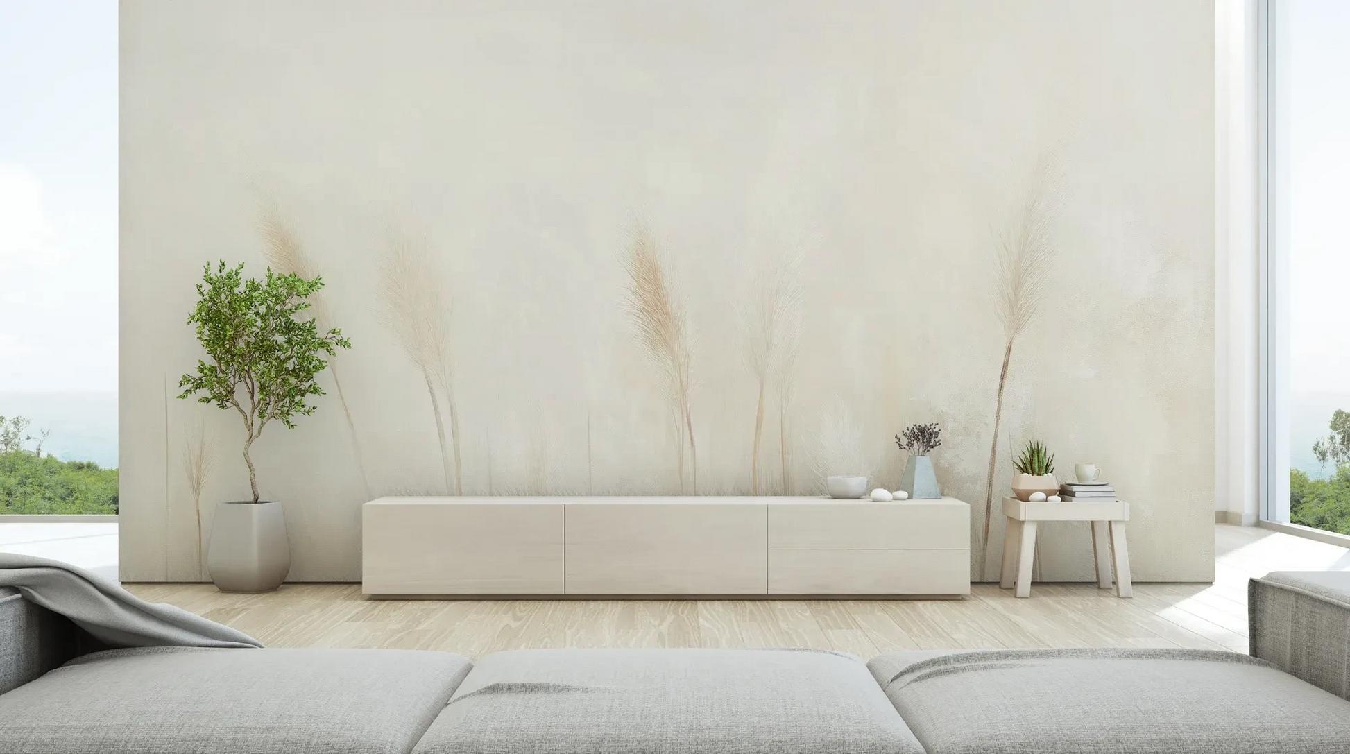 Wzór fototapety IVORY SERENITY - tapeta z delikatnymi trawami na beżowym tle pokazanej w aranżacji salonu.