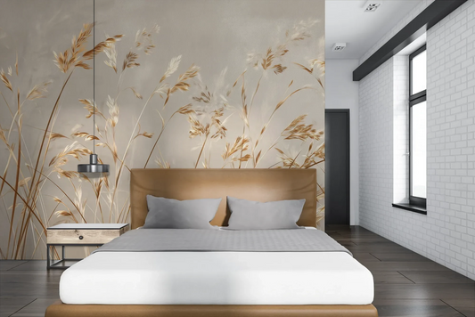 Wzór fototapety BRUSHED GOLD - tapeta z delikatnie falującymi źdźbłami traw pokazanej w aranżacji sypialni.