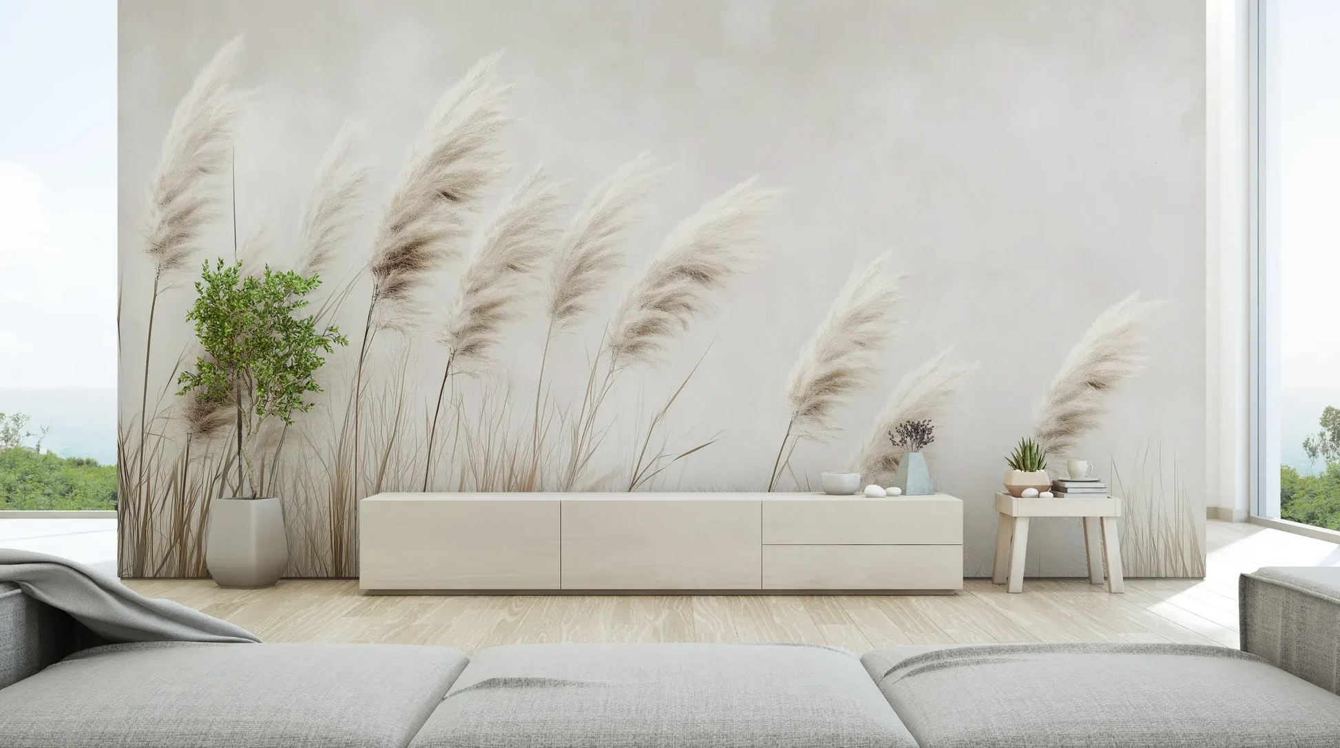 Wzór fototapety WINDSWEPT DREAMS - tapeta z delikatnymi trawami na jasnym tle pokazanej w aranżacji salonu.