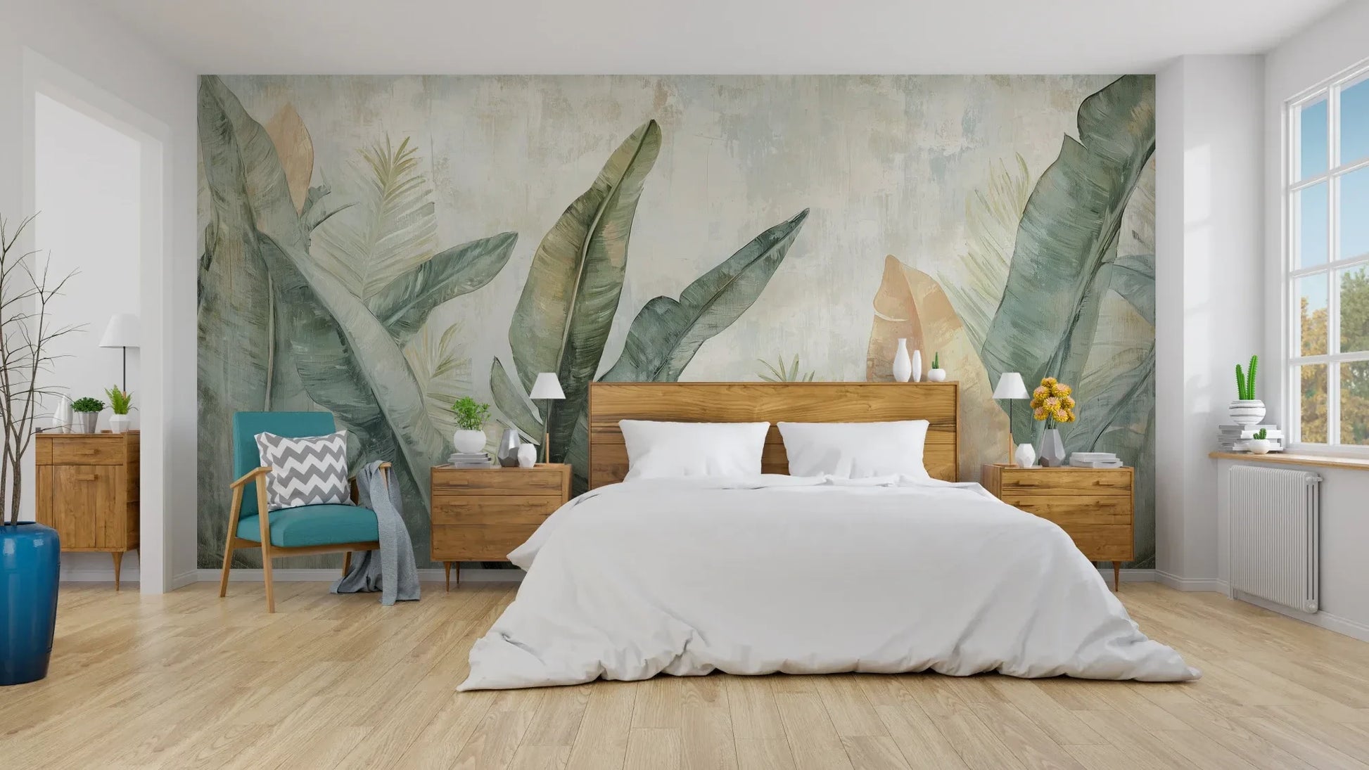 Wzór fototapety TROPIC WATERCOLORS - tapeta z egzotycznymi liśćmi w akwarelowej stylistyce pokazanej w aranżacji sypialni.