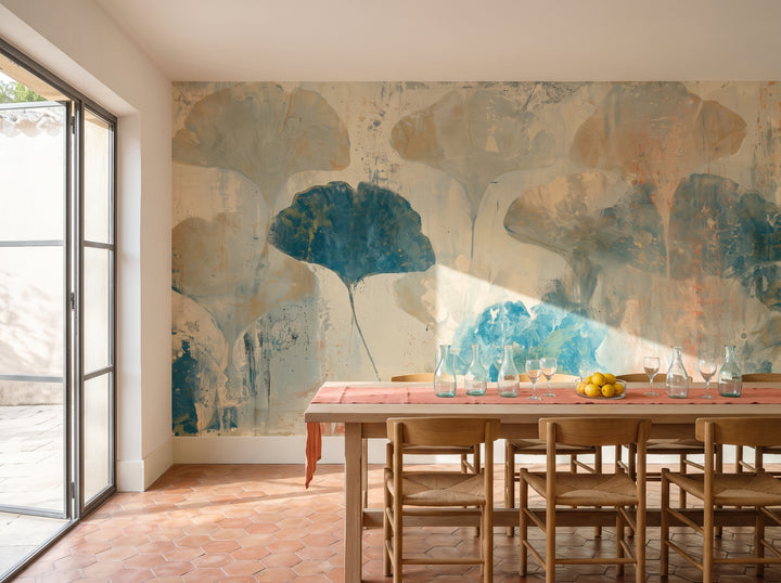 CRACKLED STUCCO in a dining room setting in a villa in Saint-Paul-de-Vence, with a long bleached oak table in front of the wall
