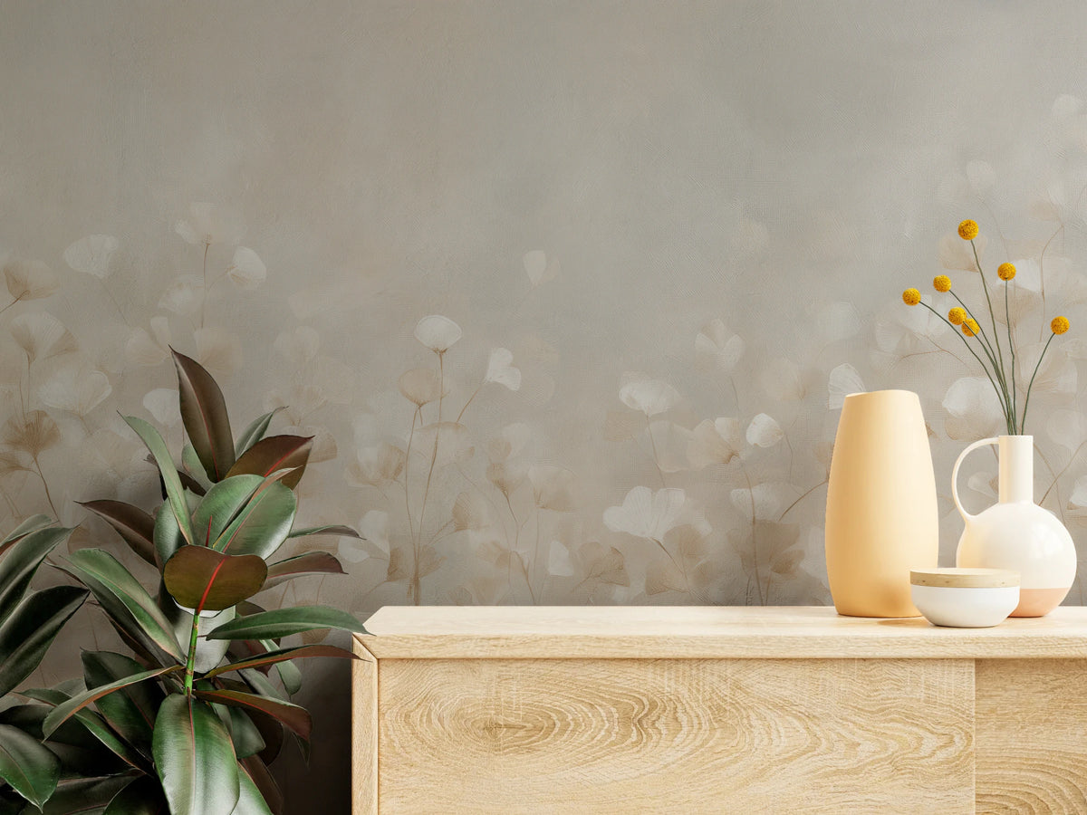 FLUTTER close up – small leaves on thin stalks behind an oak chest of drawers with vases and a ficus