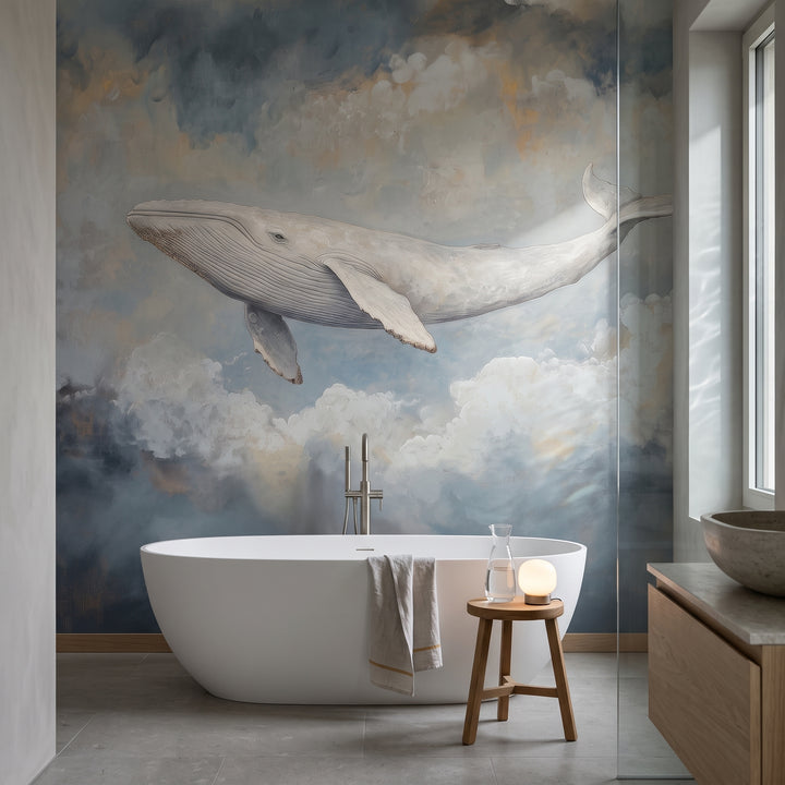GREY NIMBUS in der Raumgestaltung eines Badezimmers: weißer Wal und Wolken über weißer freistehender Badewanne, daneben Holzhocker