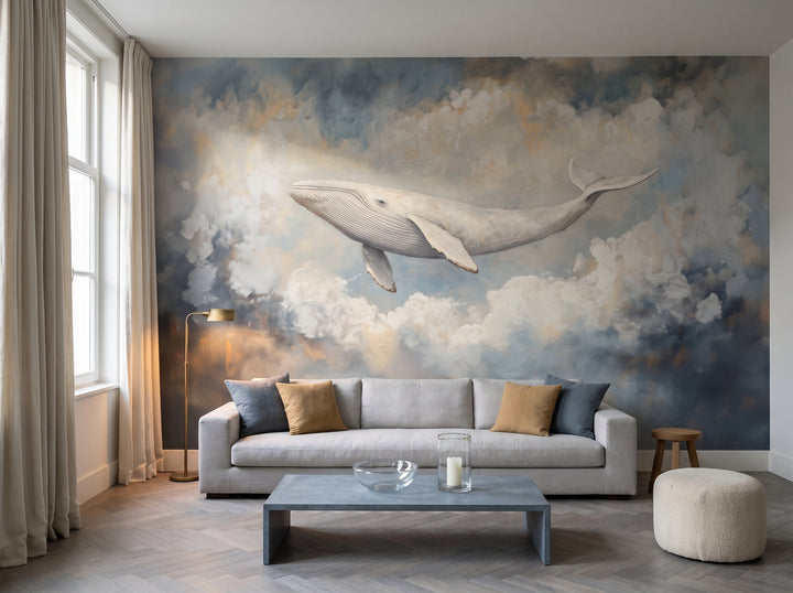 GREY NIMBUS in der Raumgestaltung eines Wohnzimmers: ganze Wand mit weißem Wal und Wolken hinter langem, niedrigem Sofa und Steintisch
