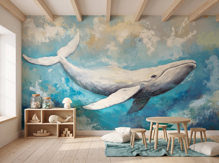LAGOON LEAP en una ambientación de sala de juegos: la ballena entera en la pared sobre una estantería con juguetes y una mesa baja con taburetes