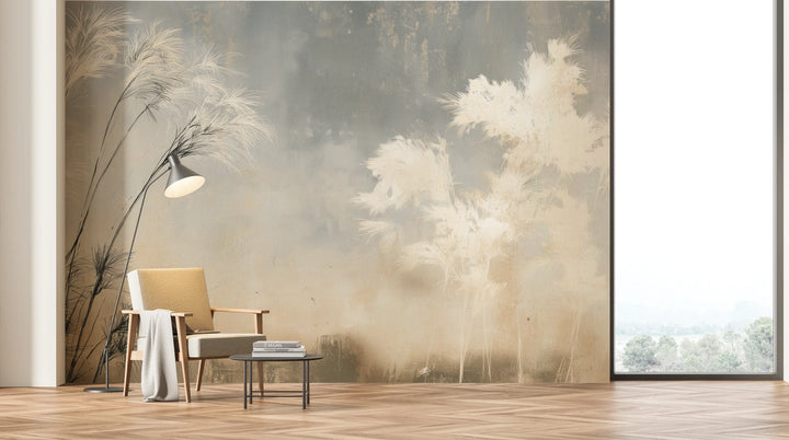 LEANING PLUMES across the whole wall of a bright living room with a window – grasses taller than the floor lamp, armchair at their base