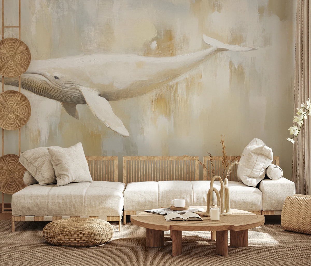 MILK AND HONEY on a full living-room wall: cream whale with a long fin above a low sofa with linen cushions