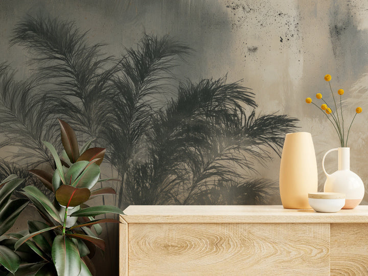 MONSOON close up – graphite feathery palm fronds and background splatters above a light chest of drawers with vases