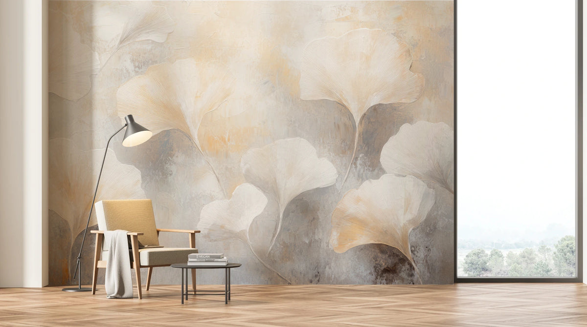 OYSTER FLURRY across the whole wall of a bright living room with a window – the leaves above the armchair and lamp show the scale of the design