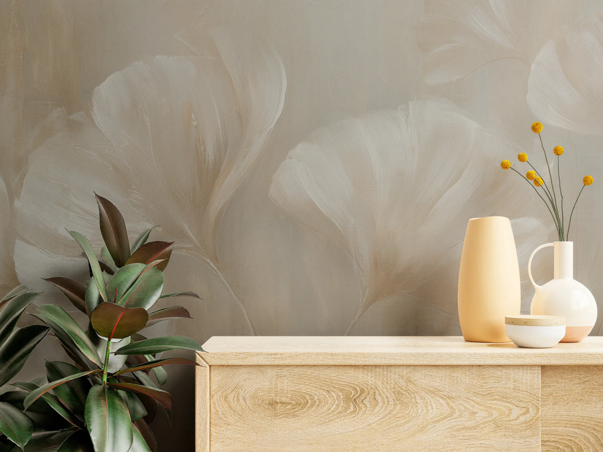 SATIN SWAY close up – the curled edges of white leaves and vertical streaks of background above a pale chest of drawers