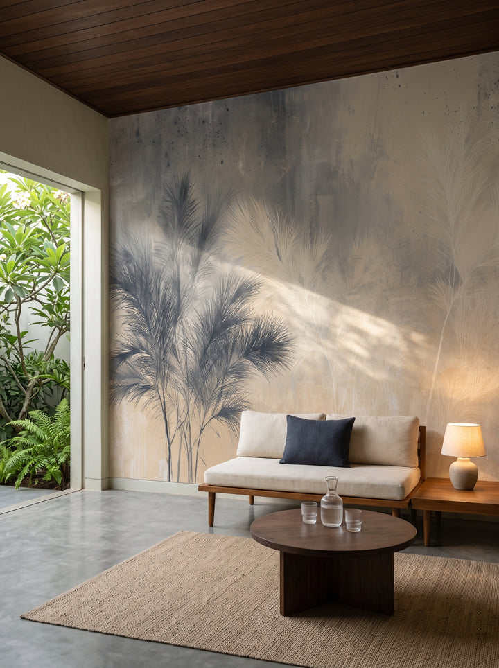 SPECKLED FROND in a living room setting in a tropical modernist house, with a low teak sofa and linen cushions in front of the wall
