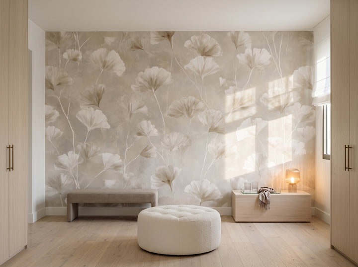 WHITE LATTICE in a dressing room setting in a villa in Marbella, with a linen bench, a low chest of drawers and a quilted pouffe in front of the wall
