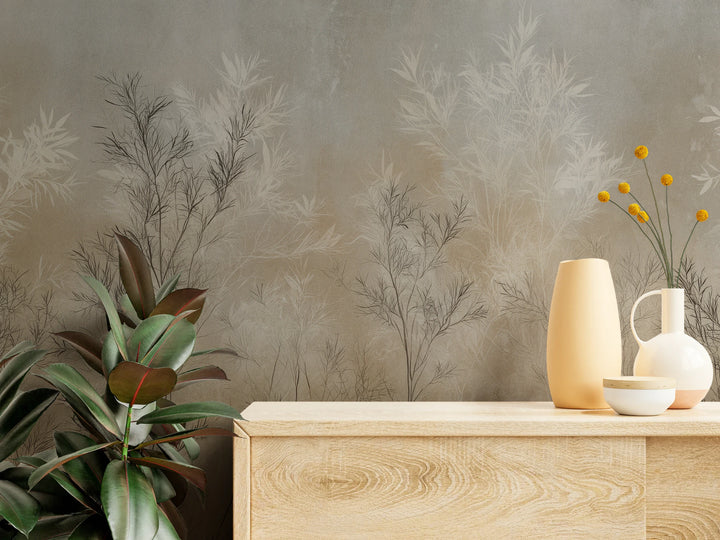 WILLOW SCREEN up close: thin graphite sprigs and pale leaves above a light wooden sideboard with vases