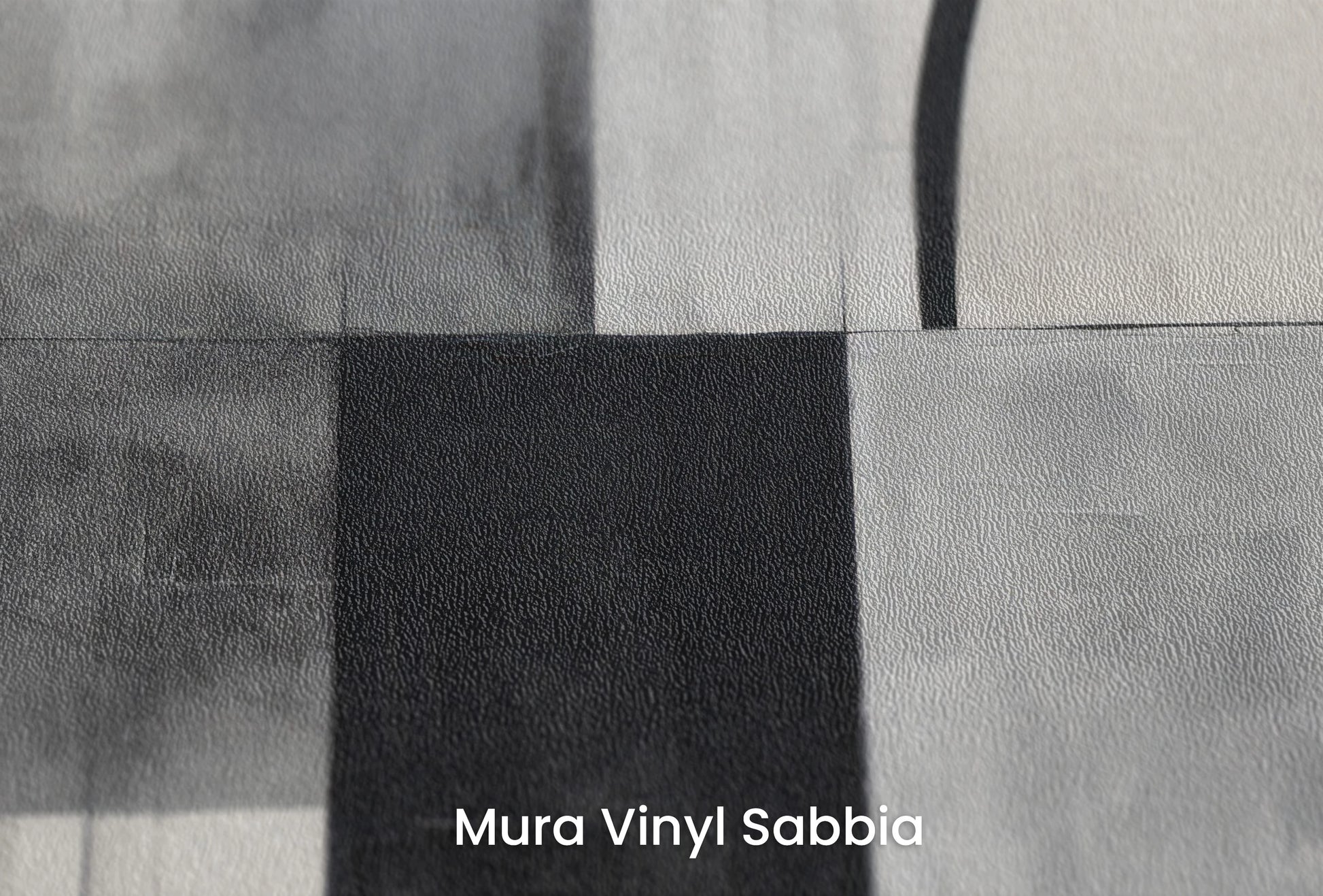 Zbliżenie na artystyczną fototapetę o nazwie Circular Elegance na podłożu Mura Vinyl Sabbia struktura grubego ziarna piasku.