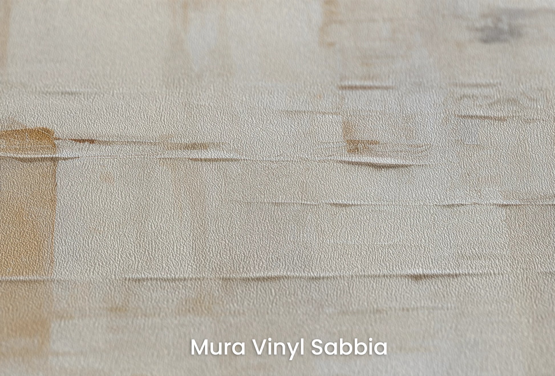 Zbliżenie na artystyczną fototapetę o nazwie Creamy Mosaic na podłożu Mura Vinyl Sabbia struktura grubego ziarna piasku.
